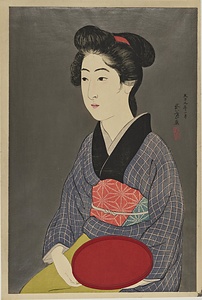 盆持てる女