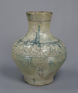 緑釉山岳文壺